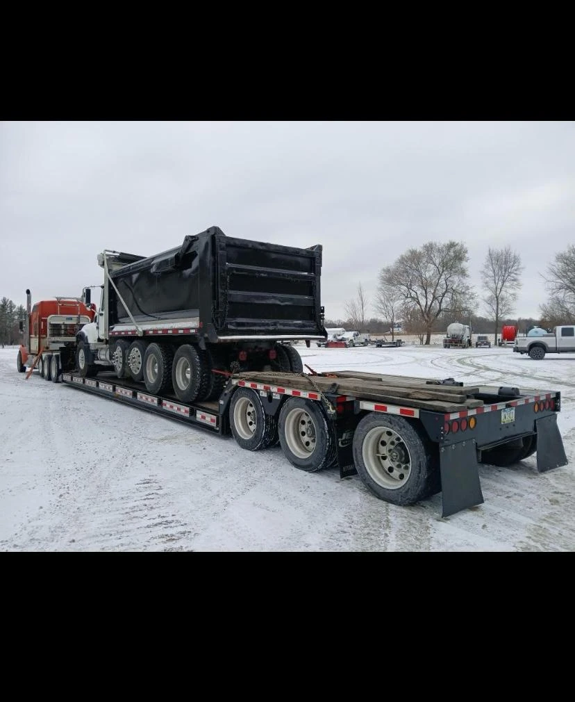 Truck on the highway at sunrise